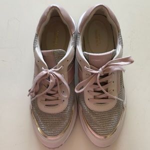 Blush pink Michael Kors sneakers with silver bling detailing with gold trim.